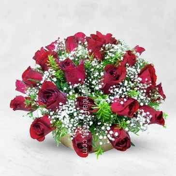 Beautifully Round Arrangement 30 stems of Red Roses nicely decorated with Greens.