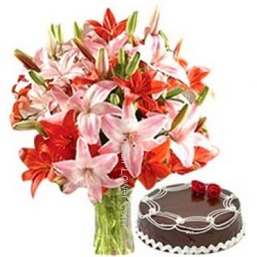 Glass Vase with 6 pc Asiatic Pink and Orange Lilies and half kg. Chocolate Truffle cake  