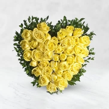 Heart Shape Arrangement of 50 Yellow Roses with fillers and greens