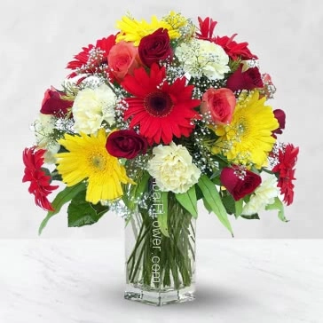 Glass Vase with Bunch of 10 mix gerberase, 10 mix roses, 10 mix carnation..Colorful flowers are great for a variety of occasions. Mixed Color Flowers in a Vase. 