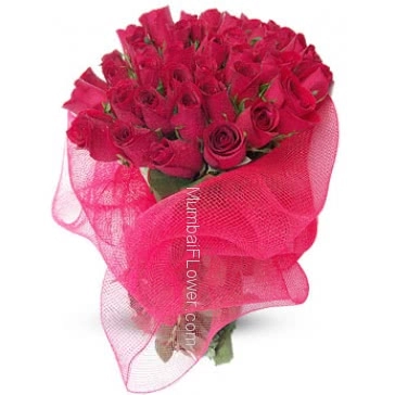 Beautifully decorated with net a Bunch of 30 Valentine Red Roses