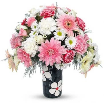 Mixed Flowers in Pinkish in a Simple Glass Vase a wonderful gift. 20 Pink and White Gerberas, 20 Pink and White Carnation and 20 White and Pink Roses