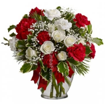 Valentine Red and White Flowers in a Simple Glass Vase a beautiful gift for your love will make evening of both of you. Please note we may substitute vase or container as per availability. 20 Red and White Carnation and 10 White Roses