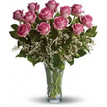 Beautiful 12 Baby Pink Roses in a Vase, a perfect gift.