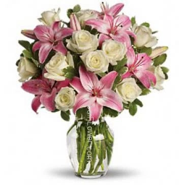 Cute White Roses and Pink Lilies in a Simple Glass Vase arranged beautifully. 6 PC Asiatic Pink Lilies and 20 Roses