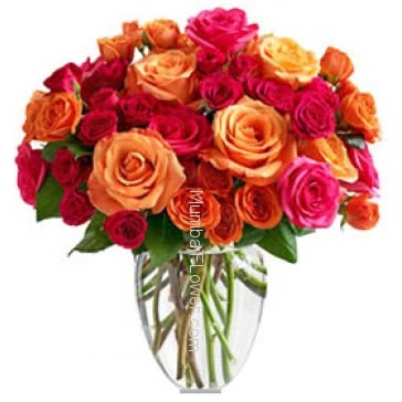 Vivid Color 30 Mixed Roses in a Simple Clear Glass Vase Beautifully arranged.