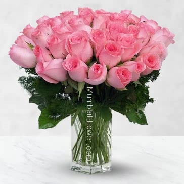 A rare and beautiful rose for someone special. 30 Pink Roses in a Vase nicely created with fillers .