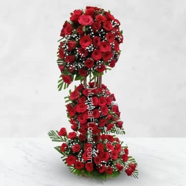 Your feelings reach new heights with this expression of Love.. Tall Arrangement of 100 Red Roses