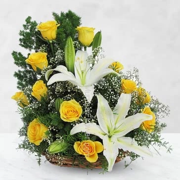 Yellow and white roses can indicate happiness and celebration. Arrangement of 12 Yellow Roses and 2 pc Asiatic White Lilies nicely decorated with Greens