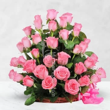 Express your love with this Basket of 30 Pink Roses nicely decorated with Greens.
