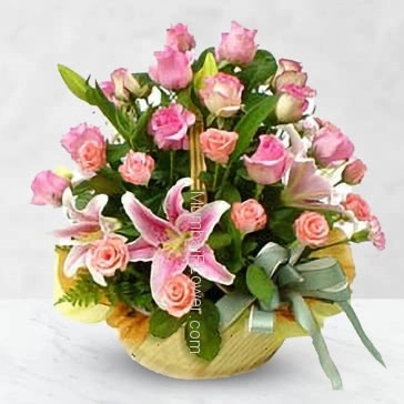 Richest and purest Basket of 30 Pink Roses and 2 pc Asiatic Pink Lilies Nicely Decorated with fillers and Ribbons.