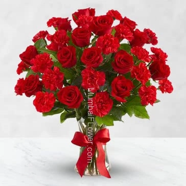 Make a day of someone you truly care about will always cherish, Bunch of 15 Red Carnation and 15 Red Roses nicely decorated and Ribbons wrapped.