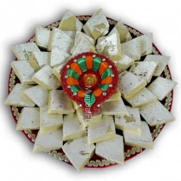 Hamper includes Pack of 1kg Kaju Katli, and diwali greeting card.