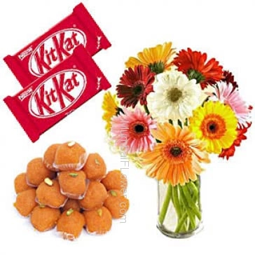 Glass Vase with 10 Mixed Gerberas and 1 kg. Motichur Ladoo with 2pc KitKat Chocolate 