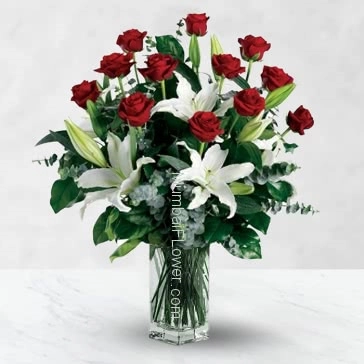 Glass Vase with 12 Red Rose and 5 pc Asiatic White Lilies nicely decorated with fillers and greens