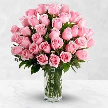Glass Vase with 40 Pink Rose nicely decorated with fillers and greens