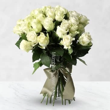 Bunch of 30 White Roses nicely decorated with fillers and ribbon... Please note: This item is not available all the time.