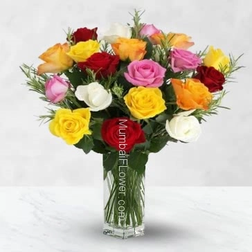 Glass vase with 20 mixed colored roses nicely decorated 