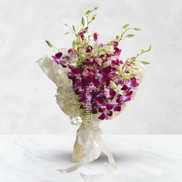 Bunch of 15 purple orchids nicely decorated with fillers and ribbons