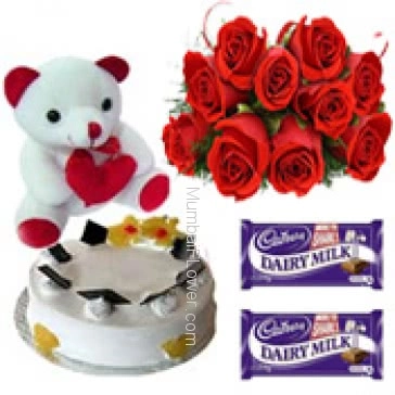 Bunch of 12 red roses nicely decorated with half kg. pineapple cake and 6 inch teddy with 2pc cadbury chocolates of Rs. 25 each