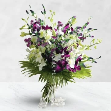 Bunch of 15 Purple and White Orchids nicely decorated with fillers and ribbons