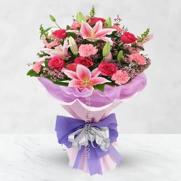 Bunch of 10 Pink carnations, 10 Pink roses and 3 pc Asiatic pink lilies nicely decorated with ribbons...paper packing