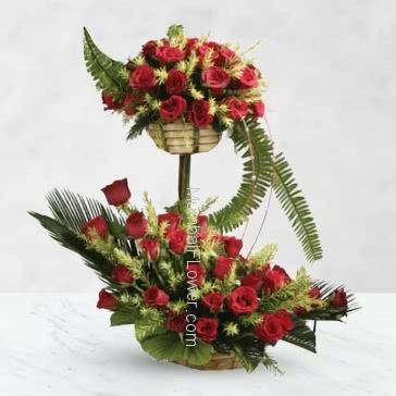 Arrangement 50 Red Roses nicely decorated with greens