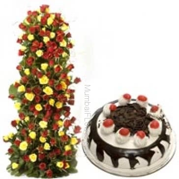 Tall arrangement of 100 Yellow and red roses nicely decorated with 1 kg.black forest cake 