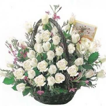 Basket of 40 White roses nicely decorated with fillers and greens