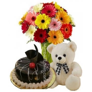 Bunch of 20 Mixed colored gerberas nicely decorated with Half kg. chocolate truffle cake and 6 inch teddy