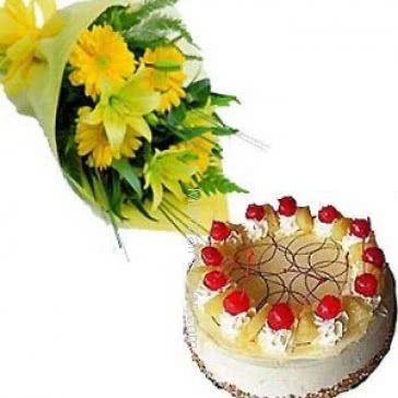 Bunch of 10 Yellow Gerberas nicely decorated with half kg. pineapple cake 