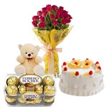 Bunch of 20 Red Roses, Half kg. Pineapple Cake , 6 Inch Teddy and 16 pc ferrero rocher chocolate