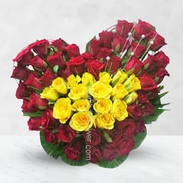 Heart Shape Arrangement of 50 Red and Yellow Roses with fillers and greens