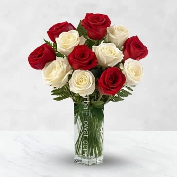 Glass Vase with 15 Mixed Red and White Roses with filers and greens