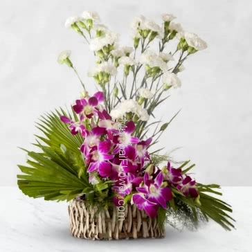 Arrangement of 20 White Carnation and 6 PC Purple Orchids nicely decorated with greens. <b>Please note:</b> we may substitute color in case of unavailability 