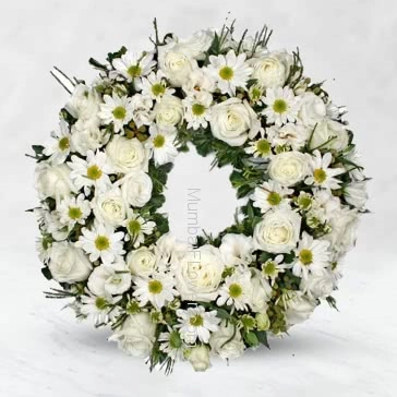 With heartfelt condolences.With deepest sympathy. Wreath Sympathy Flowers. 20 White Gerberas and 30 White Roses
