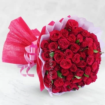 Hand bouquet of 70 Red Roses nicely decorated with paper packing and ribbons, let it speak love aloud