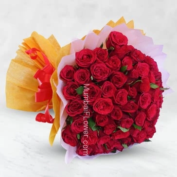 Bunch of 60 Red Roses nicely decorated with fillers ribbons and colored Paper packing, exotic and madly in romance.