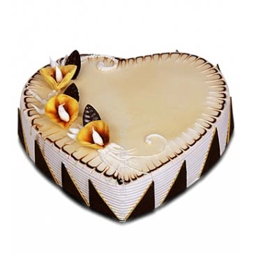 1 Kg. Choco Vanila Heart Shape Cake... Order 1 Day in advance. Please note : Cake icing may differ from shown picture.