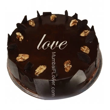 1 Kg. Best Quality Walnut Truffle Cake, best in taste and flavour... Order 1 Day in advance. Please note : Cake icing may differ from shown picture.