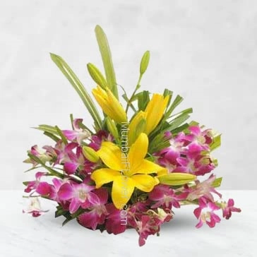 Arrangement Bouquet of 2 pc Asiatic Yellow Lilies and 10pc Purple Orchids nicely decorated with fillers and greens