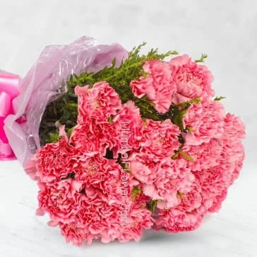 Bouquet of 15 Carnations nicely decorated with fillers ribbons and Color Paper Packing