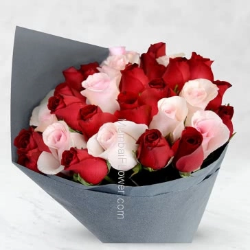 Hand Bouquet of 30 Red and Pink Roses nicely decorated with fillers and ribbons with Color Paper Packing