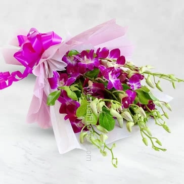 Bouquet of 15 Purple Orchids nicely decorated with fillers ribbons and color Paper Packing