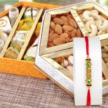 1pc Rakhi with 250gms Dry Fruits and 500gms of Mixed Mithai , Raksha Bandhan Gift Combo. Please note : Rakhi Design / Basket / Boxes /  Container may be replaced in case of unavailability/out of stock.