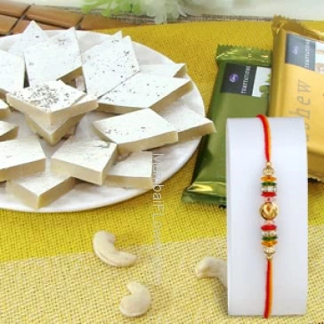 1pc Rakhi with 250gms Kaju Katli and 2pc Cadbury Temptation chocolates. Please note : Rakhi Design / Basket / Boxes /  Container may be replaced in case of unavailability/out of stock.