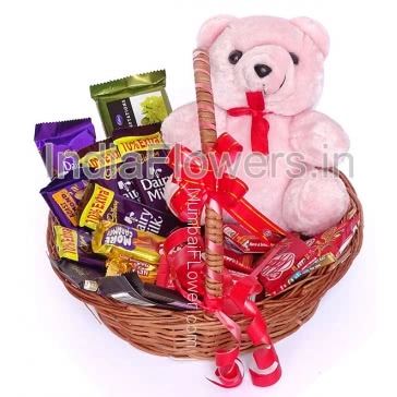 Basket of mixed Chococolates and a Teddy, This basket total of 1pc Cabdury Temptation 72g., 1pc Cabdury Silk 55g., 1 Dairymilk fnt 38g., 2pc Bournville 31g., 2pc 5Star 43g., 5pc Kitkat 18g., 5pc Cabdury Dairymilk 25g. with 6 Inch Teddy Bear and ribbons