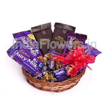 Basket of Dairymilk and Bournville Chocolates with eclairs, contains 2pc Bournville 31g. and 4pc Dairy milk flavoured 36g. and 5pc eclairs chocolates.
