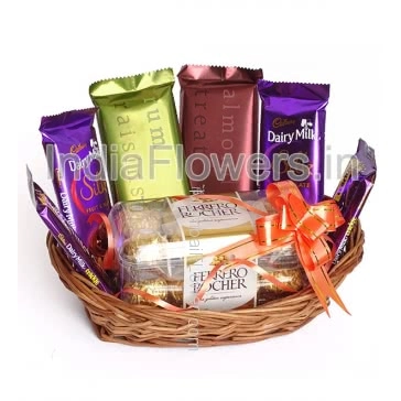 Basket of Premium Chocolates. Contains 2pc Temptations 72g., 2pc Dairymilk Silk 55g., 2pc Cadbury Dairymilk 36g. and Box of 16pc Ferrero Rocher Chocolates