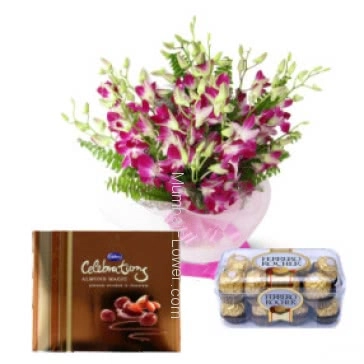 Perfect for any celebration beautiful Bunch of 10 Orchids a Small Cadbury Celebration pkt and 16 pcs Ferrero Rocher Chocolates.
